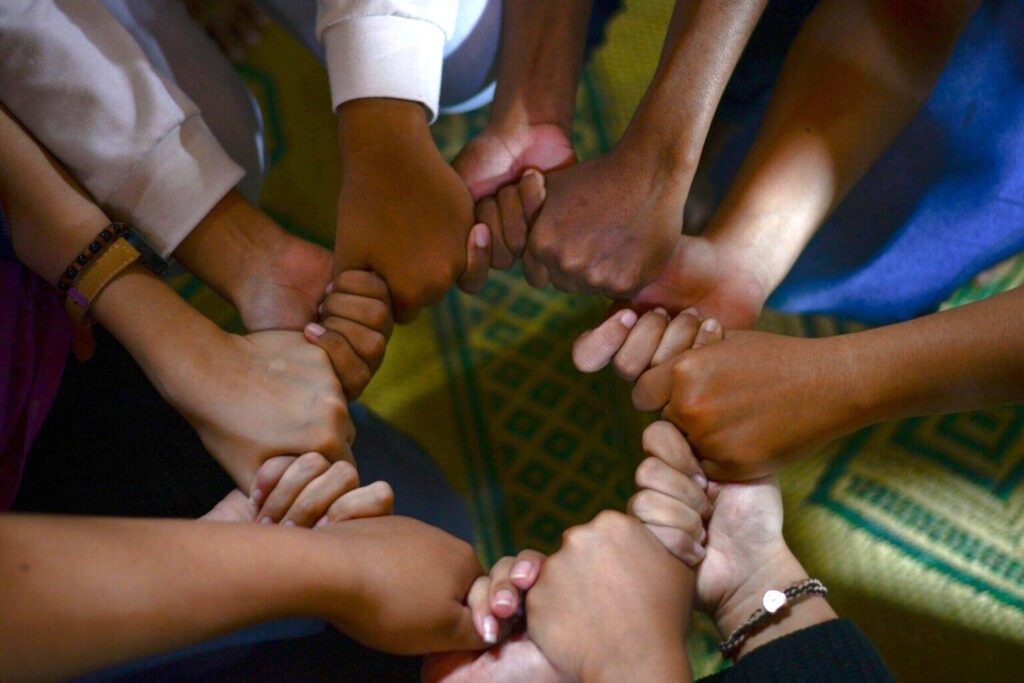 people holding hands